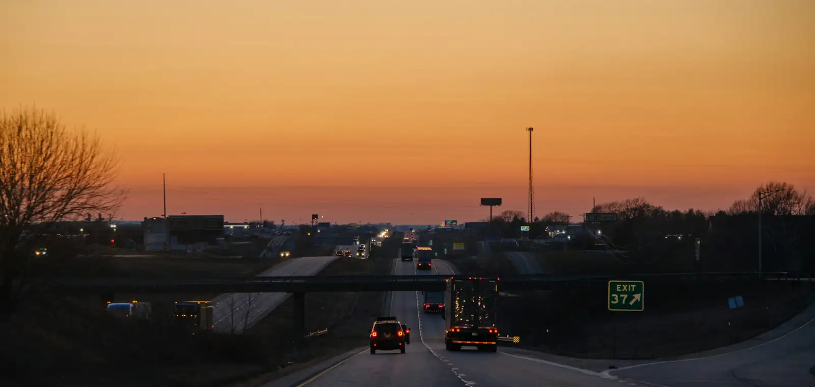 Highway traffic at sunset
