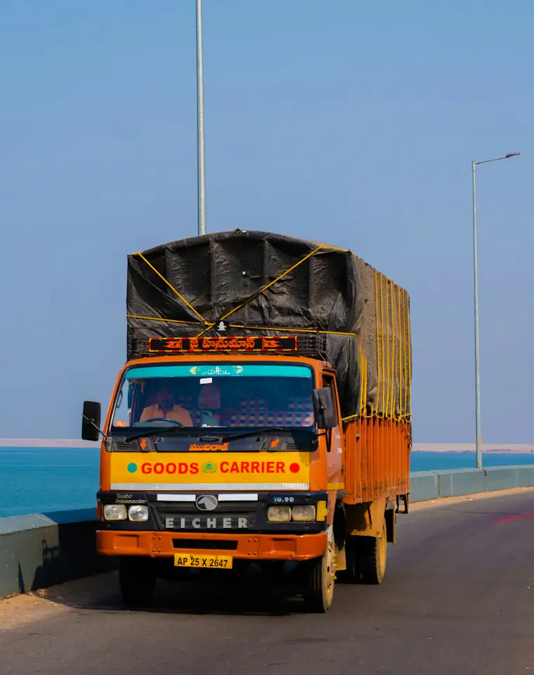 Loaded Indian truck on a coastal road