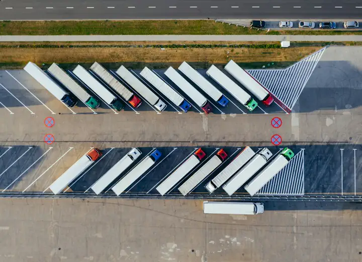 Aerial view of trucks parked in a row